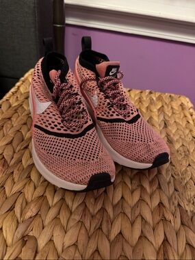 Nike Women’s Pink and Black Flyknit Running Shoes